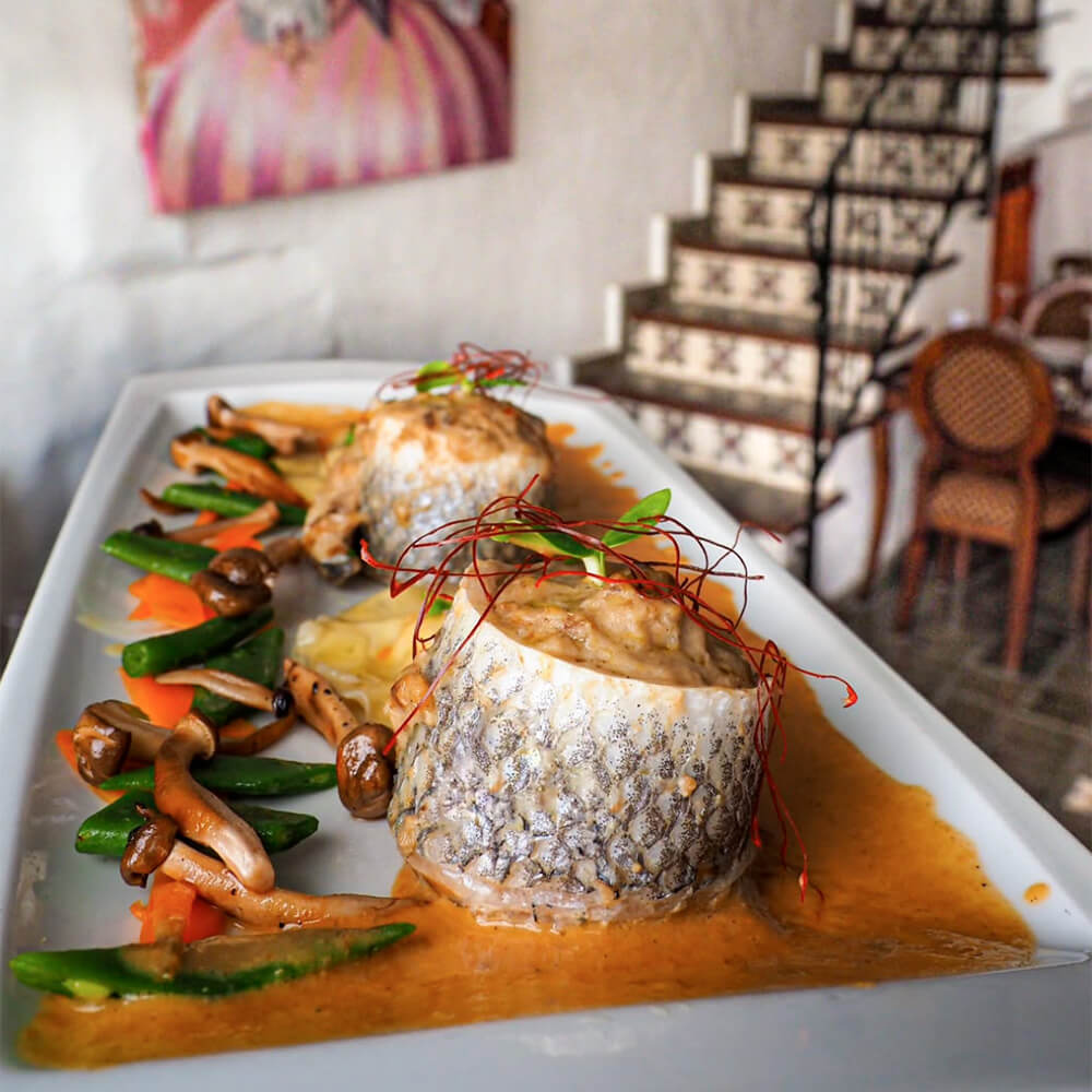 lubina al horno de Cafe Bistro Sol 32 En es Mercadal